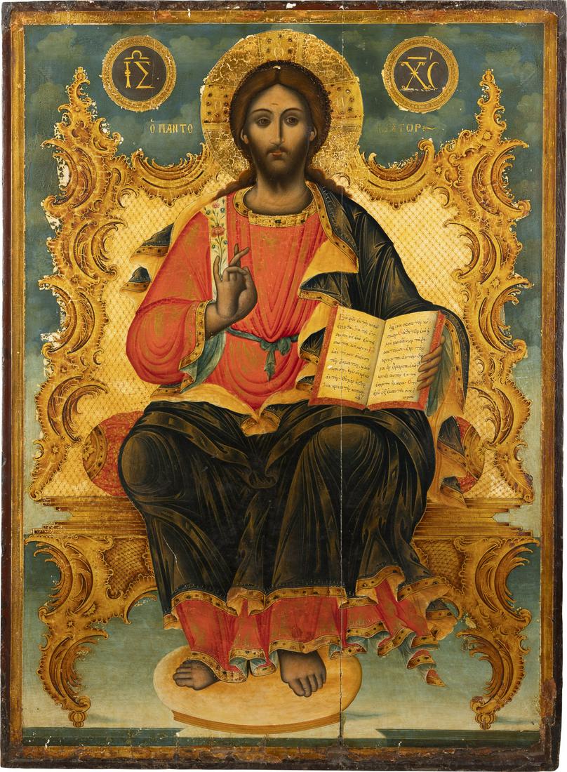 A MONUMENTAL ICON SHOWING THE ENTHRONED CHRIST FROM A: A MONUMENTAL ICON SHOWING THE ENTHRONED CHRIST FROM A CHURCH ICONOSTASIS Greek, 18th century Tempera on wood panel. Christ seated on an imposing wooden throne with gold highlights, his right hand rais