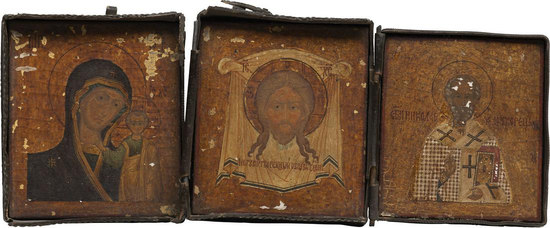 A MINIATURE TRIPTYCH SHOWING ST. NICHOLAS OF MYRA, THE: A MINIATURE TRIPTYCH SHOWING ST. NICHOLAS OF MYRA, THE MANDYLION AND THE KAZANSKAYA MOTHER OF GOD Russian, 19th century Tempera on wood panels. Finely executed in great detail on a gold ground. Metal 