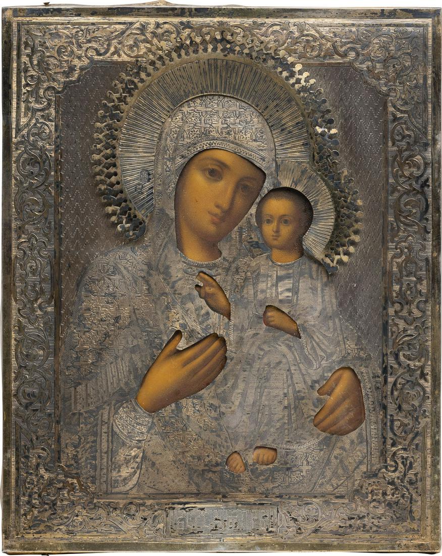 A SMALL ICON SHOWING THE IVERSKAYA MOTHER OF GOD WITH A: A SMALL ICON SHOWING THE IVERSKAYA MOTHER OF GOD WITH A SILVER-GILT OKLAD Russian, 2nd half 19th century (icon), Russian, Moscow, 1885 (oklad) Oil on wood panel with velvet backing. Overlaid with a fi