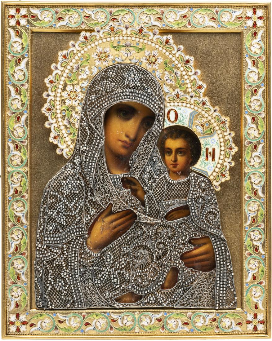 AN ICON SHOWING THE TIKHVINSKAYA MOTHER OF GOD WITH A: AN ICON SHOWING THE TIKHVINSKAYA MOTHER OF GOD WITH A SILVER-GILT, CLOISONNÃ‰ ENAMEL AND FILIGREE OKLAD Russian, 2nd half 19th century (icon), 2nd half 20th century (oklad) Oil on wood panel with v