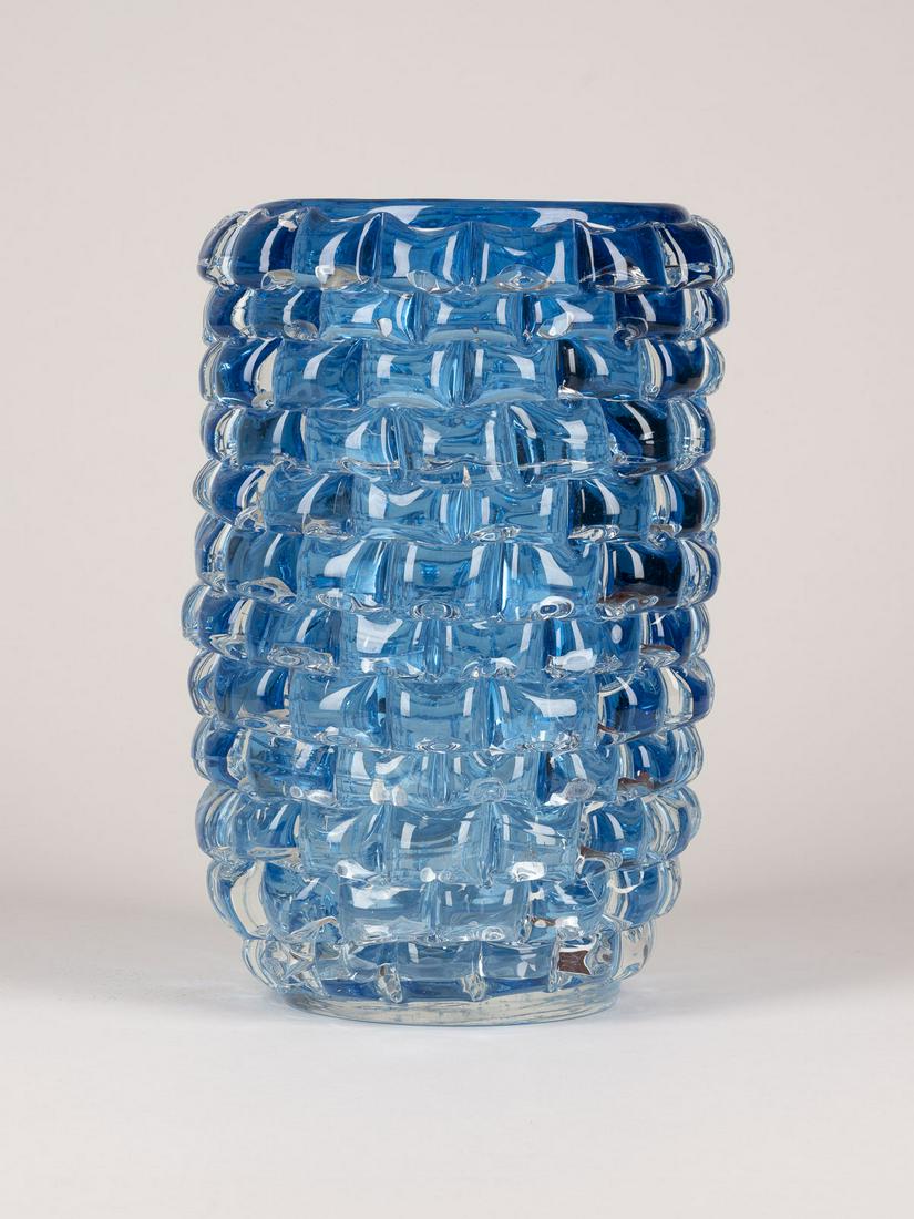 , CENEDESE VASE 'BUGNATO BLU': CENEDES VASE 'BUGNATO BLU' Italy, Murano, Cenedese, 2nd half of the 20th century. Thick-walled, colourless glass, horizontal ribbon-applications of light blue glass cubes, polished bottom. H. 30 cm, d