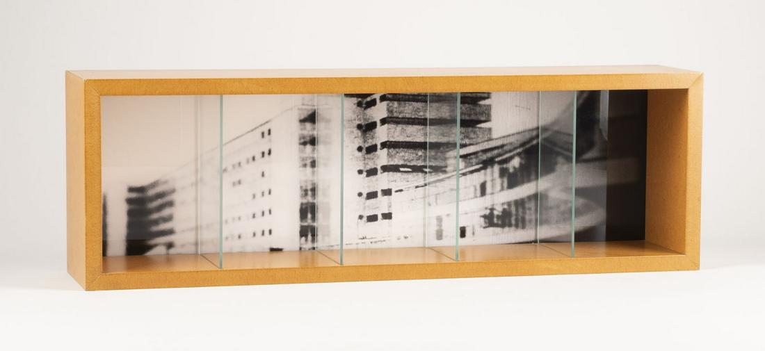 MISCHA KUBALL 'DENKPRINZIP V' (1991): MISCHA KUBALL 1959 Duesseldorf - lives and works in Duesseldorf 'THINKING PRINCIPLE V' (1991) Object box, photography, glass, formica wood box. 20 x 62,5 x 12,5 cm. Signed 'Mischa Kuball' on the rever