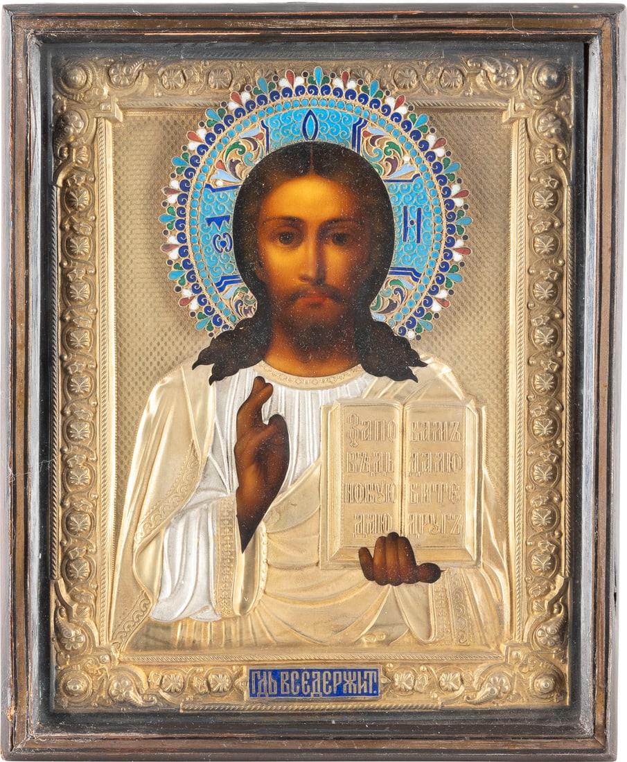 AN ICON SHOWING CHRIST PANTOKRATOR WITH A SILVER-GILT AND CLOISONNE ENAMEL OKLAD WITHIN: AN ICON SHOWING CHRIST PANTOKRATOR WITH A SILVER-GILT AND CLOISONNE ENAMEL OKLAD WITHIN KYOT Russian, circa 1900 (icon), Russian, Moscow, Semen Galkin, 1896-1908 (oklad) Oil on wood panel with velvet