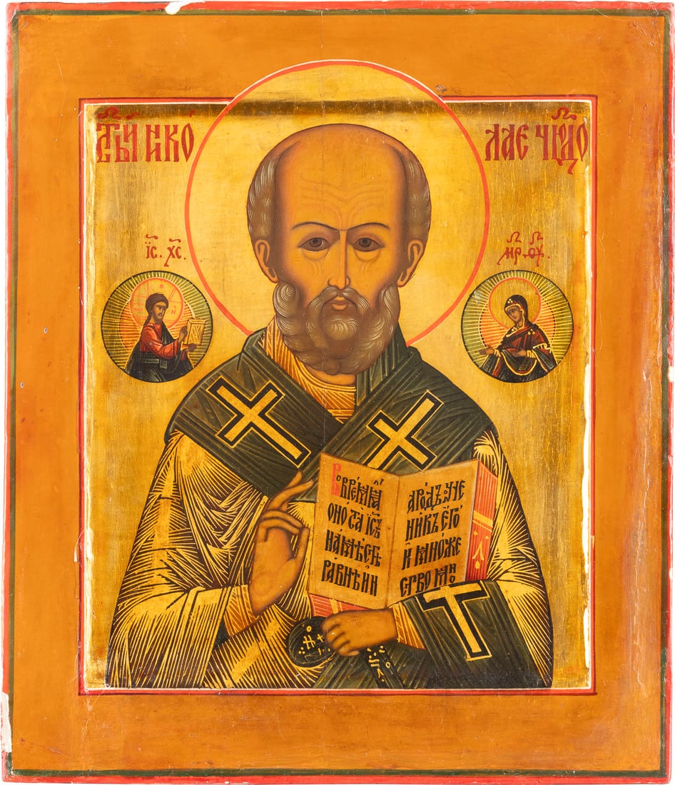 AN ICON SHOWING ST. NICHOLAS OF MYRA: AN ICON SHOWING ST. NICHOLAS OF MYRA Russian, late 19th century Tempera on wood panel with kovcheg. The background made of silver, covered by a golden lacquer. The edges minimally chipped, the border