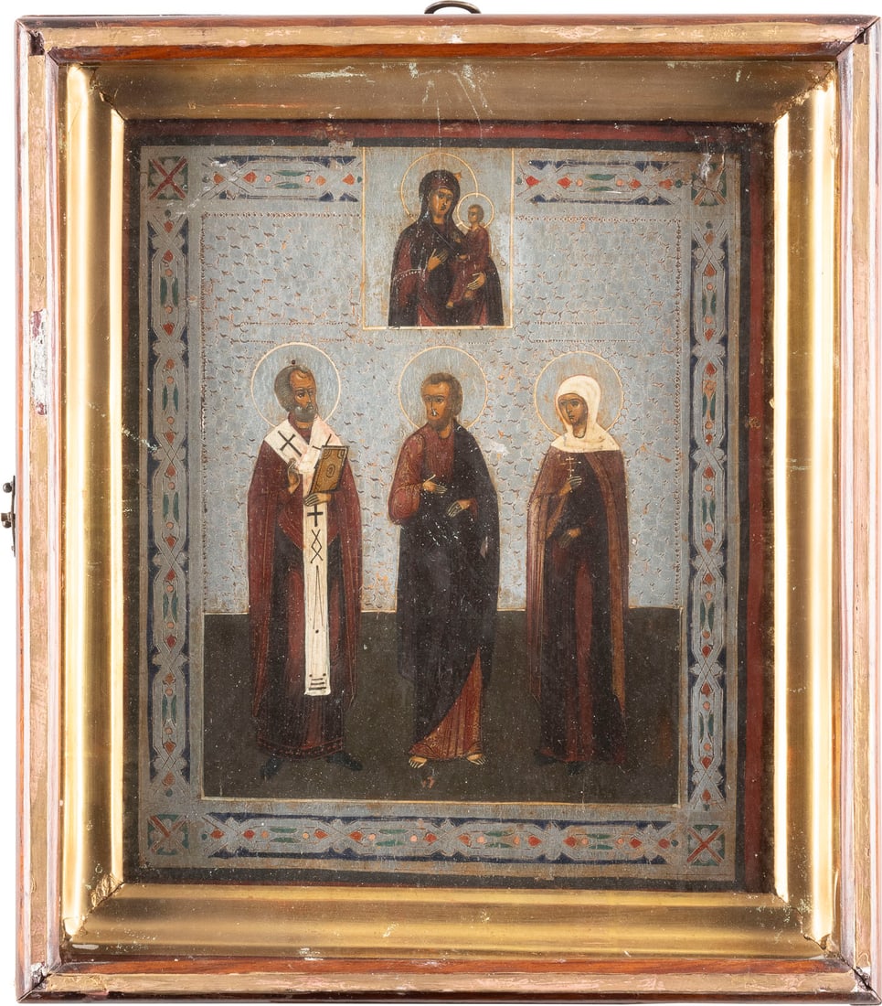 AN ICON SHOWING THE TIKHVINSKAYA MOTHER OF GOD AND THREE SELECTED SAINTS WITHIN KYOT: AN ICON SHOWING THE TIKHVINSKAYA MOTHER OF GOD AND THREE SELECTED SAINTS WITHIN KYOT Russian, late 19th century Tempera on wood panel. The background made of silver, ornately incised. The borders orna