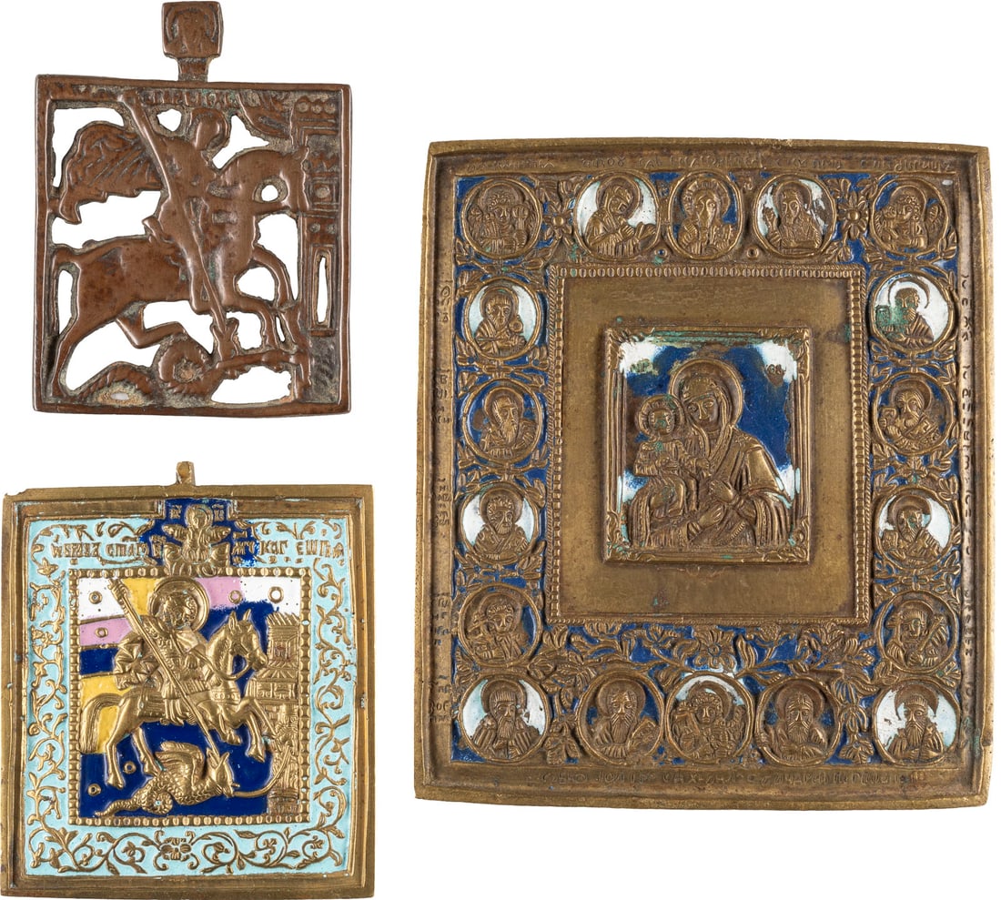 DREI BRONZE-IKONEN: HEILIGER GEORG DER DRACHENTÖTER UND DREIHÄNDIGE GOTTESMUTTER 'TRICHEIROUSA': THREE BRASS ICONS SHOWING ST. GEORGE KILLING THE DRAGON AND THE THREE-HANDED MOTHER OF GOD Russian, 17th-19th century Cast in relief. Enamel partially minimally chipped, one icon minimally damaged. 8.