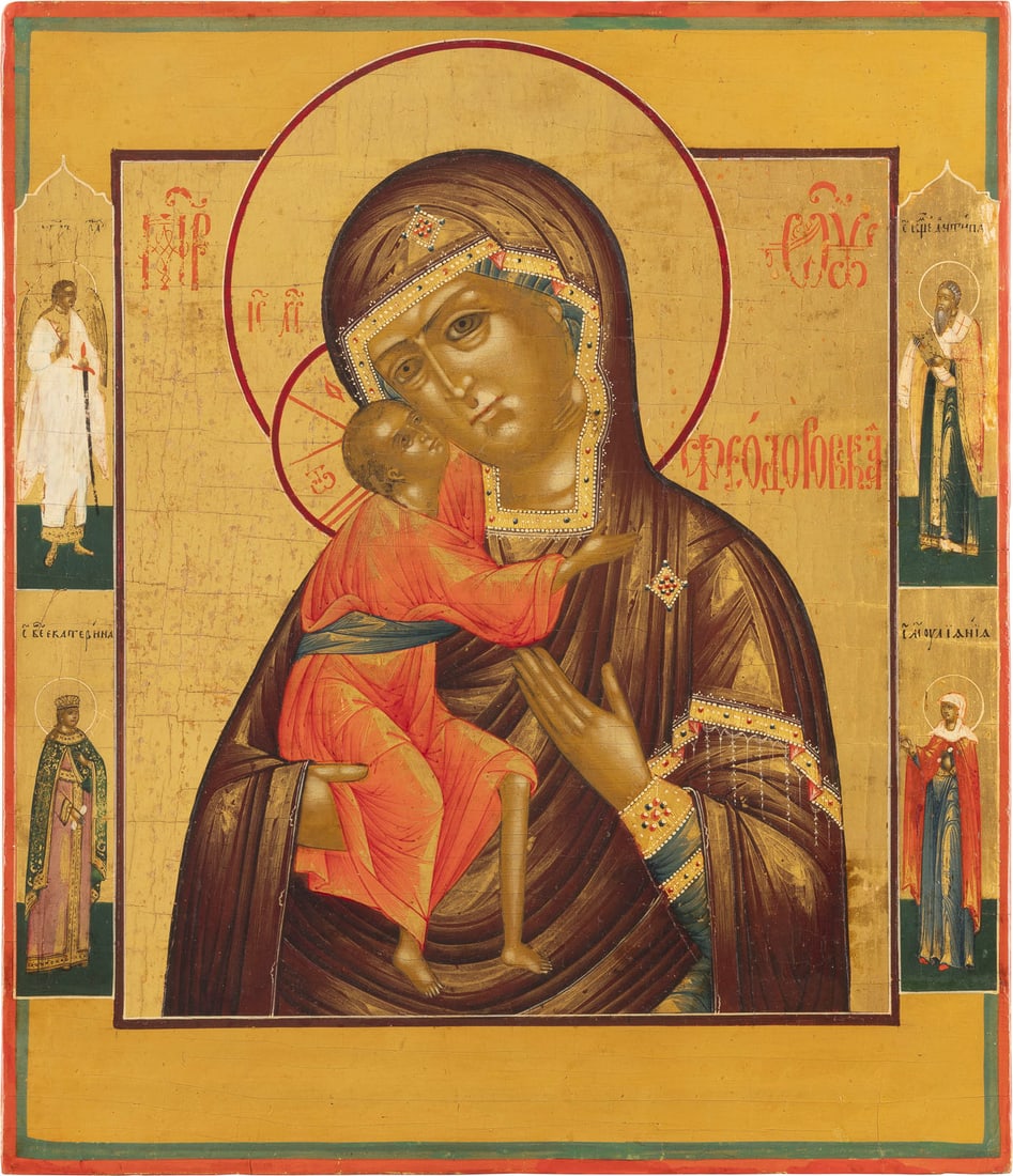 IKONE MIT DER GOTTESMUTTER FEODOROWSKAJA: AN ICON SHOWING THE FEODOROVSKAYA MOTHER OF GOD Russian, early 19th century Tempera on wood panel. Finely executed on a gold ground. Four family patron saints on the borders, the Guardian Angel and St