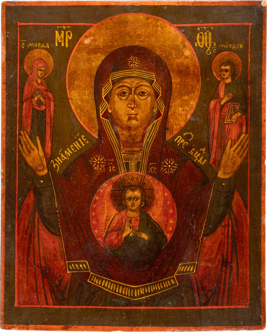 IKONE MIT DER GOTTESMUTTER DES ZEICHENS (ZNAMENIE) FLANKIERT VON DEN HEILIGEN MARTHA UND DEM: AN ICON SHOWING THE MOTHER OF GOD OF THE SIGN FLANKED BY STS. MARTHA AND MATTHEW THE EVANGELIST Russian, 19th century Tempera on wood panel. The haloes made of silver, covered by a golden lacquer. 28.