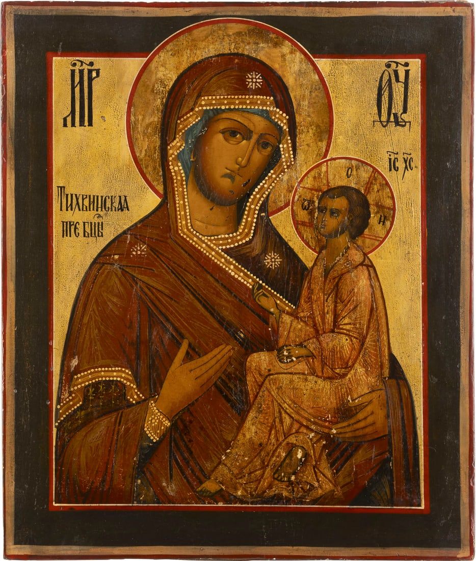 IKONE MIT DER GOTTESMUTTER VON TICHWIN (TICHWINSKAJA): AN ICON SHOWING THE TIKHVINSKAYA MOTHER OF GOD Russian, 19th century Tempera on wood panel. The haloes made of silver, covered by a golden lacquer. Wearings, partially restored. 35.8 x 30.3 cm._x0013_