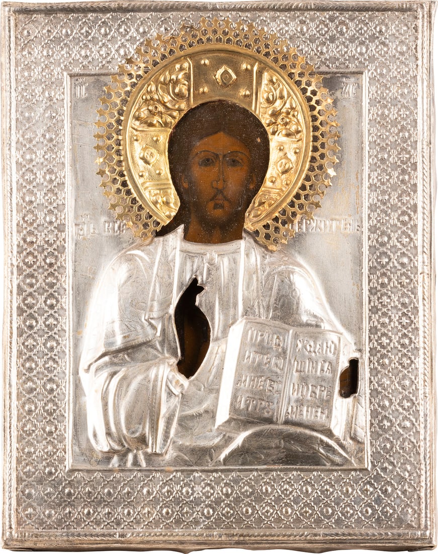 IKONE MIT CHRISTUS PANTOKRATOR MIT OKLAD: AN ICON SHOWING CHRIST PANTOKRATOR WITH OKLAD Russian, 2nd half 19th century Tempera on wood panel. Overlaid with a metal oklad. Minimally restored. 22.3 x 17.8 cm._x0013_IKONE MIT CHRISTUS PANTOKRATO