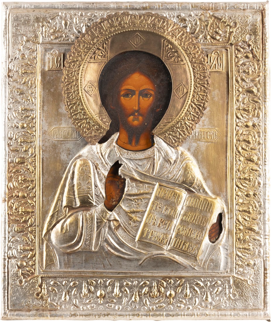 IKONE MIT CHRISTUS PANTOKRATOR MIT OKLAD: AN ICON SHOWING CHRIST PANTOKRATOR WITH OKLAD Russian, 2nd half 19th century Tempera on wood panel. Overlaid with a chased metal oklad. Minimally worn. 31.2 x 26 cm._x0013_IKONE MIT CHRISTUS PANTOKRAT