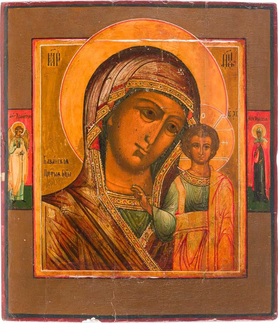 IKONE MIT DER GOTTESMUTTER VON KASAN (KASANSKAJA): AN ICON SHOWING THE MOTHER OF GOD OF KAZAN Russian, 2nd half 19th century Tempera on wood panel with kovcheg. Two selected saints on the borders. Vertical crack restored, areas of retouching, damages 
