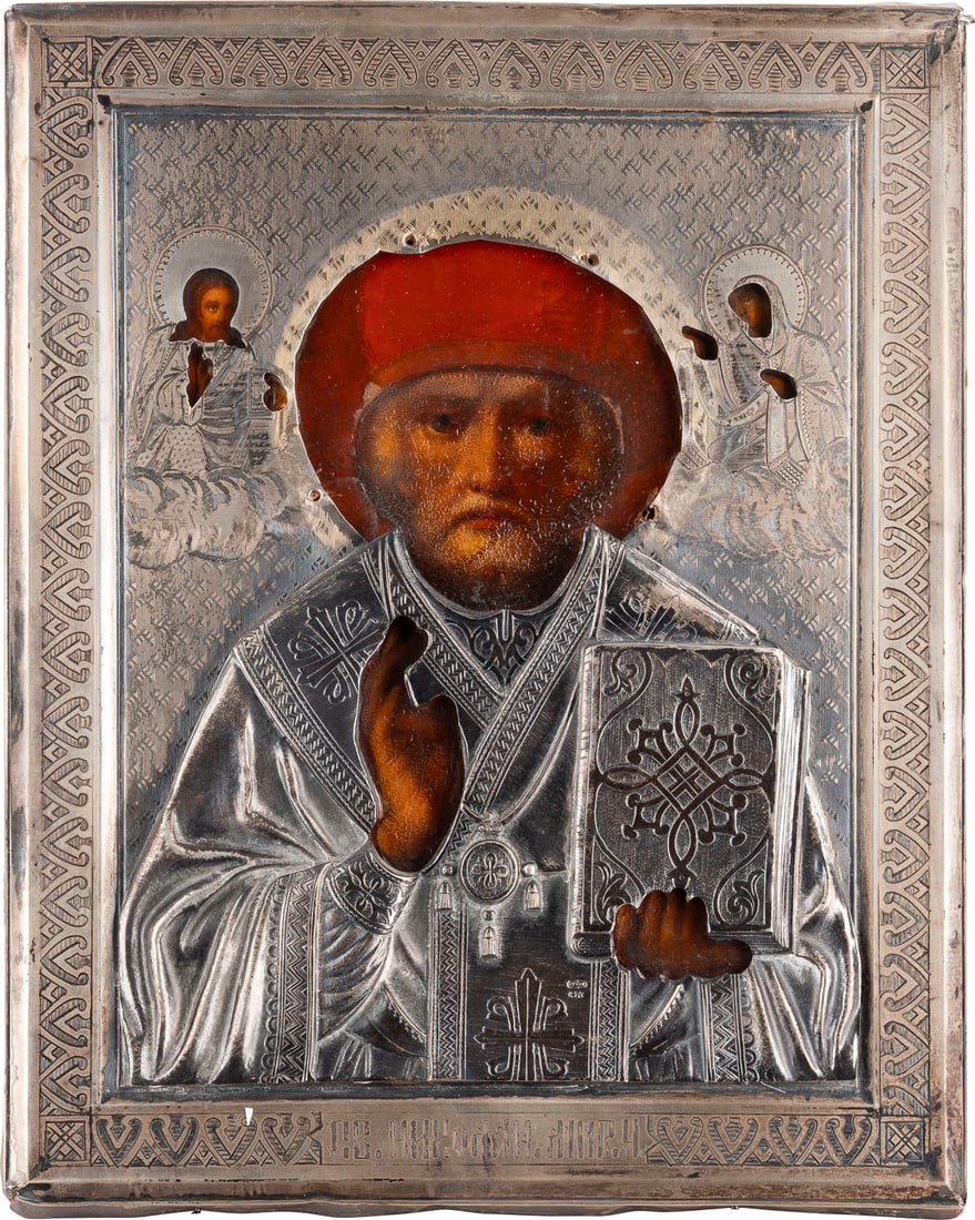 KLEINE IKONE MIT DEM HEILIGEN NIKOLAUS VON MYRA MIT SILBER-OKLAD: A SMALL ICON SHOWING ST. NICHOLAS OF MYRA WITH A SILVER OKLAD Russian, late 19th century (icon), Russian, Moscow, late 19th century (oklad) Oil on wood panel with velvet backing. Overlaid with a chase