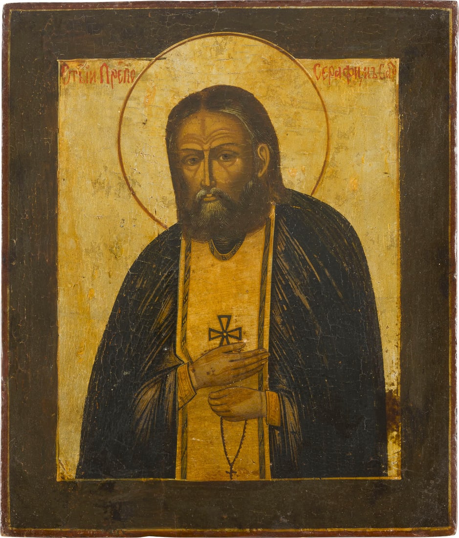 IKONE MIT DEM HEILIGEN SERAFIM VON SAROW: AN ICON SHOWING ST. SERAPHIM OF SAROV Russian, after 1903 Tempera on wood panel. The background made of silver, covered by a golden lacquer. Minimally restored. 30.5 x 25.9 cm.IKONE MIT DEM HEILIGEN S