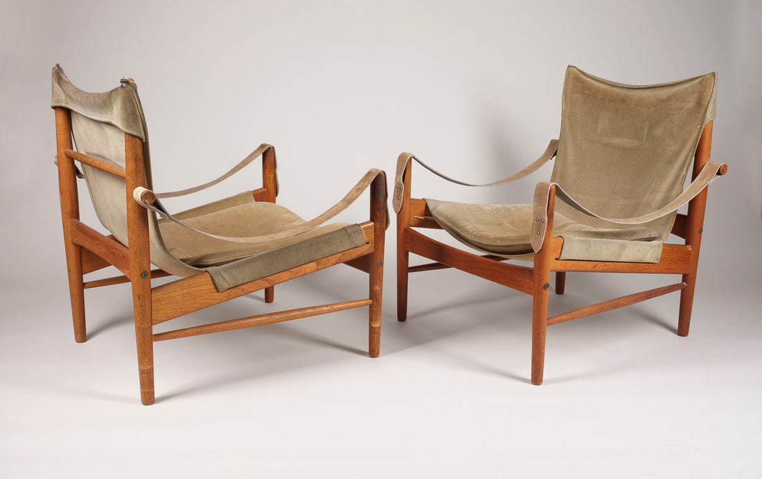 HANS OLSEN - PAAR SAFARI SESSEL MODELL 'ANTILOPE': HANS OLSEN 1919 - 1992 PAIR OF SAFARI ARMCHAIRS 'ANTELOPE' Sweden, Viskadalens Moebelindustri, around 1960 Teak and brown suede. H. 75 cm, W. 64 cm, D. 66 cm. Branded in the frame: 'MADE IN SWEDEN BY
