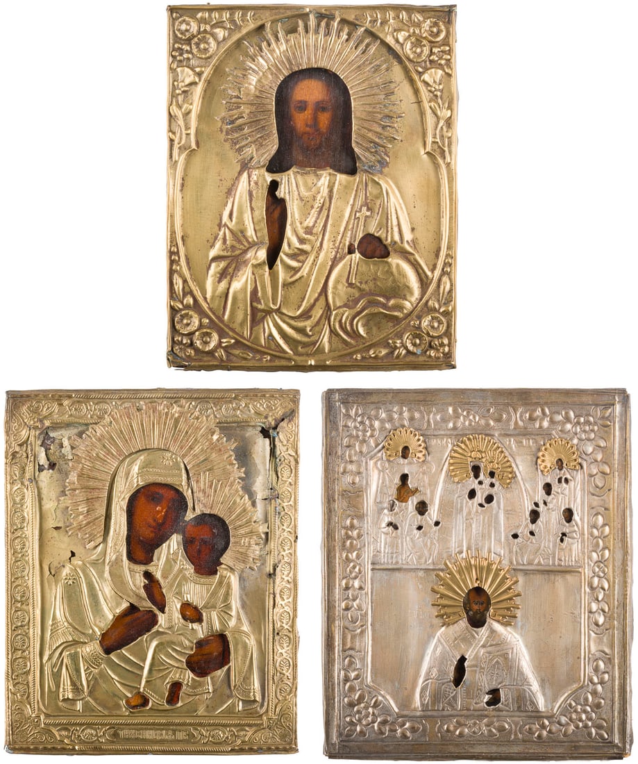 THREE ICONS WITH OKLAD SHOWING CHRIST PANTOKRATOR, THE TIKHVINSKAYA MOTHER OF GOD AND A: THREE ICONS WITH OKLAD SHOWING CHRIST PANTOKRATOR, THE TIKHVINSKAYA MOTHER OF GOD AND A TWO-PARTITE ICON Russian, 19th century Tempera / oil on wood panels. Overlaid with chased brass oklads. Minor da