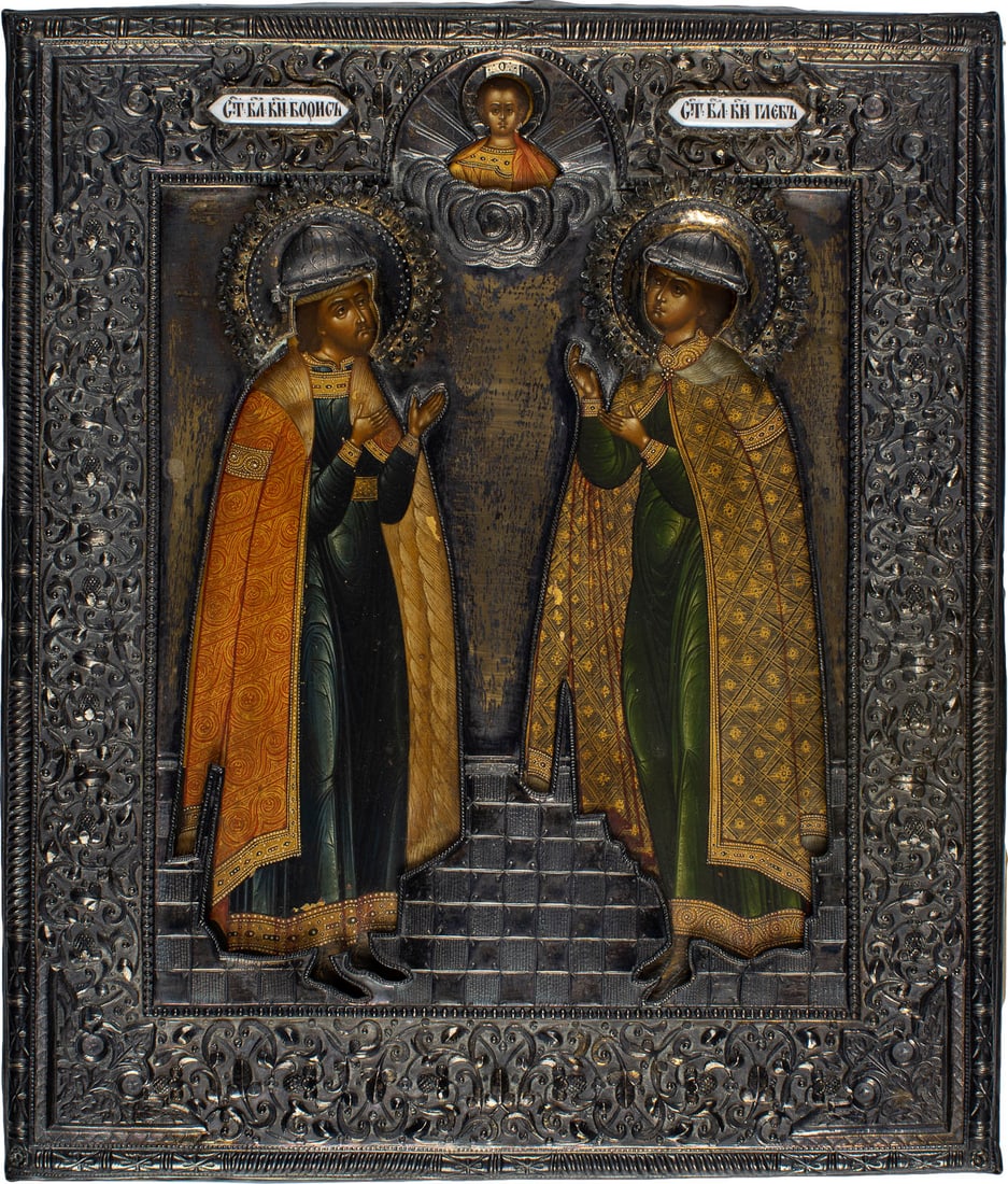 A FINE ICON SHOWING STS. BORIS AND GLEB WITH A SILVER-GILT RIZA: A FINE ICON SHOWING STS. BORIS AND GLEB WITH A SILVER-GILT RIZA Russian, mid 19th century (icon), Russian, Moscow, M.N. Fetisov, 1853 (riza) Tempera on wood panel with kovcheg, velvet backing. Finely 
