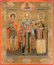 AN IMPORTANT SIGNED AND DATED ICON OF SAINT NICHOLAS OF MYRA, FLANKED BY STS. GEORGE AND