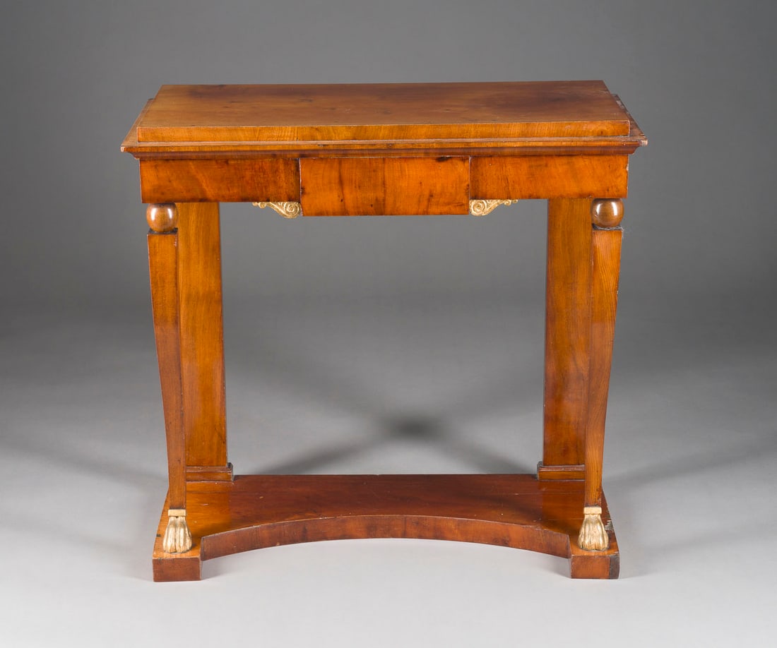| EMPIRE KONSOLTISCH: EMPIRE CONSOLE TABLE France, probably early 19th century. Mahogany, veneered, gilt claw feet. H. 83, W. 85, D. 41 cm. Partially restored and damaged.EMPIRE KONSOLTISCH Frankreich, wohl Anfang 19. Jh.
