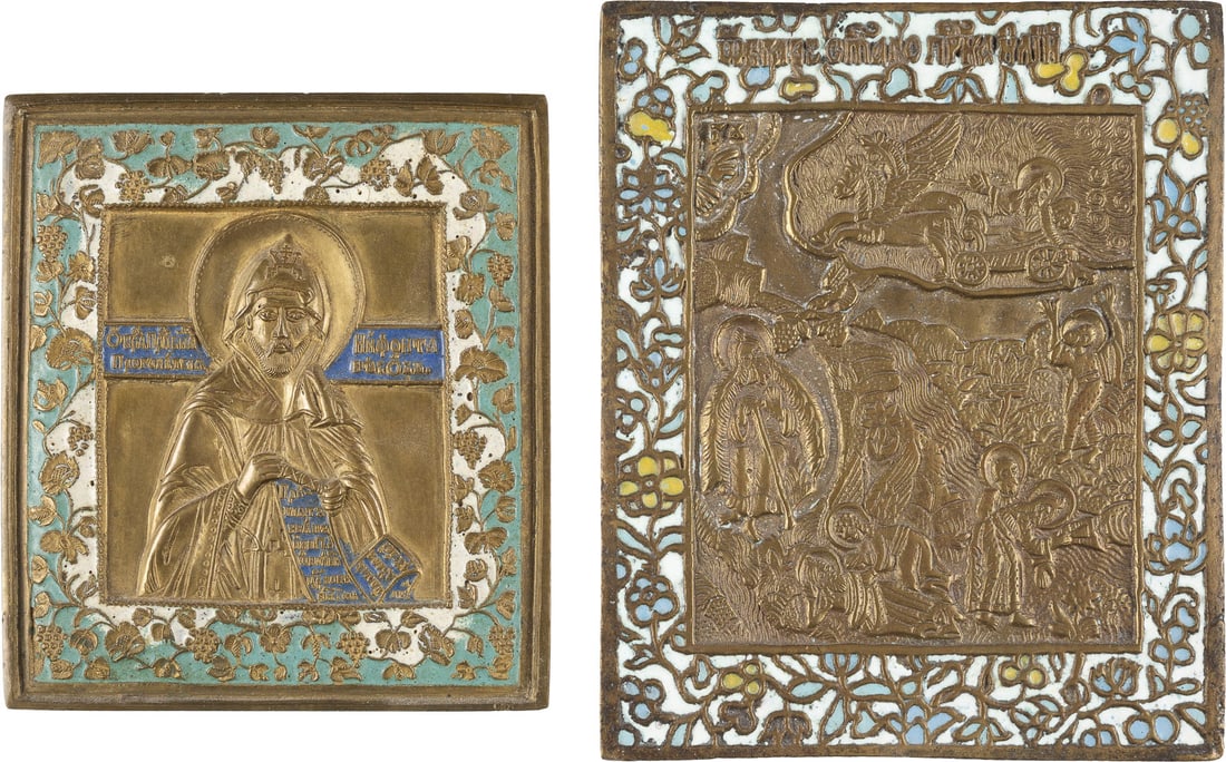 TWO BRASS AND ENAMEL ICONS DEPICTING ST. HIPHONT AND THE PROPHET ELIJAH AND HIS FIERY: TWO BRASS AND ENAMEL ICONS DEPICTING ST. HIPHONT AND THE PROPHET ELIJAH AND HIS FIERY ASCENT TO HEAVEN Russian, 19th century Cast in relief, three- or four-colour enamelled. Enamel very slightly chipp