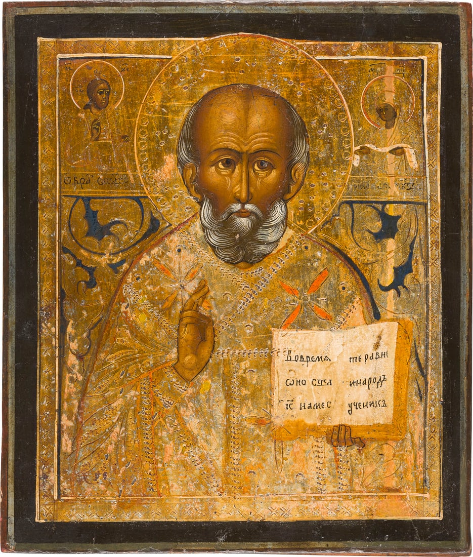 AN ICON SHOWING ST. NICHOLAS OF MYRA: AN ICON SHOWING ST. NICHOLAS OF MYRA Russian, 19th century Tempera on wood panel. The background and garments made of silver, covered by a golden lacquer, ornately incised. Vertical crack restored. 30
