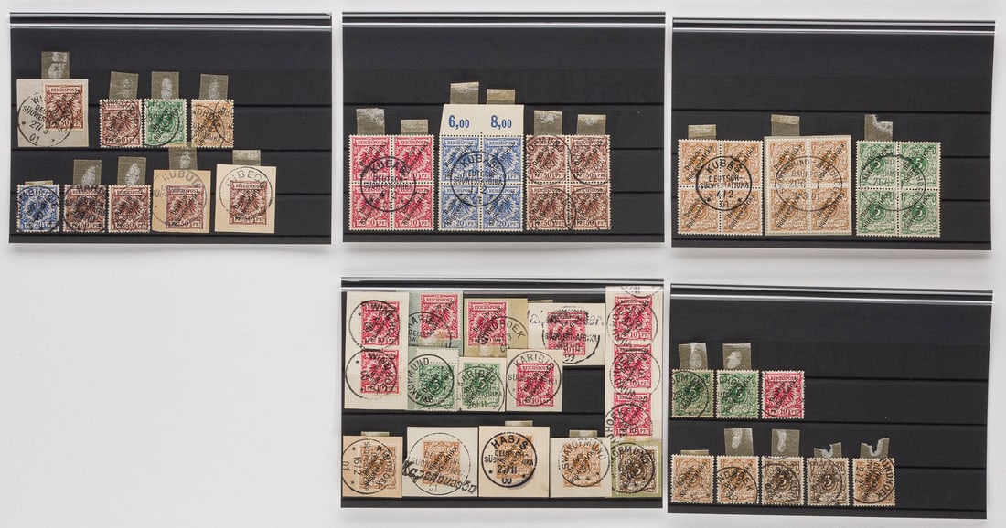 DEUTSCHE KOLONIEN: DEUTSCHE KOLONIEN Deutsch-Südwestafrika Konvolut 57 diverse Marken, teilweise auf Briefausschnitt mit Mehrfachfrankaturen, alle mit diagonalem schwarzen Aufdruck 'Deutsch-Südwestafrika'.