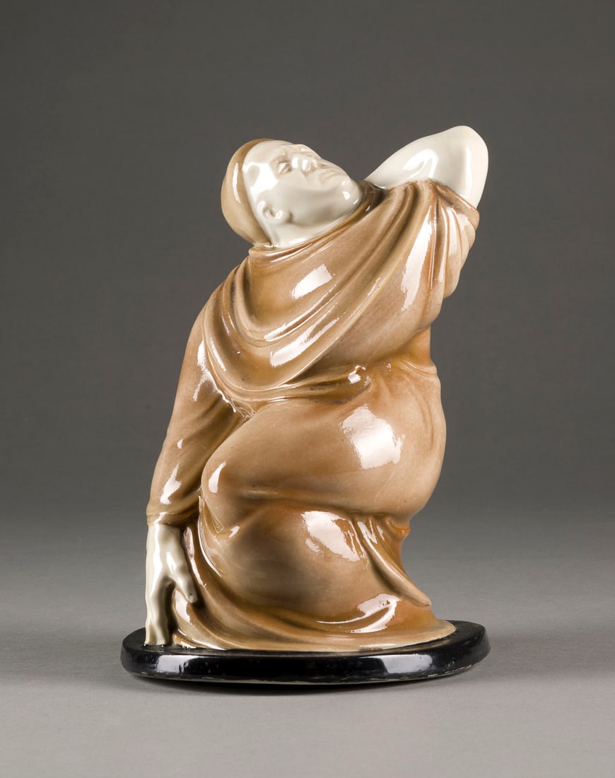 BERNHARD HOETGER | KNIENDER MÖNCH: BERNHARD HOETGER 1874 - 1949 KNIENDER MÖNCH 20. Jh. Steinzeug, farbig glasiert. H. 23,5 cm. Modellnr. '4961'.KNIENDER MÖNCH