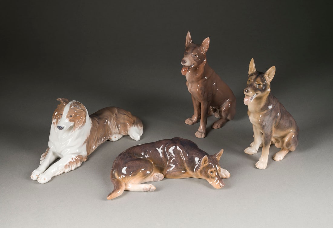 | VIER HUNDEFIGUREN: VIER HUNDEFIGUREN Dänemark, Royal Copenhagen und Bing & Gröndahl, 20. Jh. Porzellan, polychrom gefasst. H. 7-22 cm. Verschieden Manufakturmarken, Pressnummern, Malerzeichen. Bestehend aus: 2