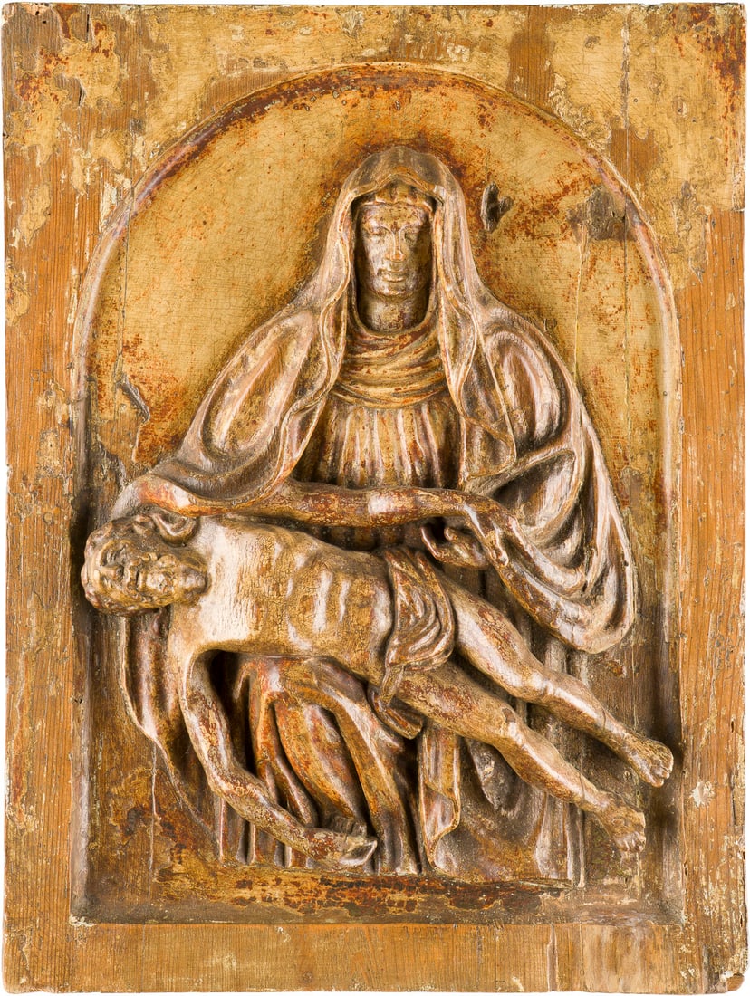| RELIEF: 'PIETA': RELIEF: 'PIETA' Flandern, wohl 17. Jh. Holz, reliefiert, gebeizt und gewachst, im Rundbogen, vermutlich ehemals Tabernakel- oder Schreintür. H. 42 x 31,5 cm. Part. best.RELIEF: 'PIETA'