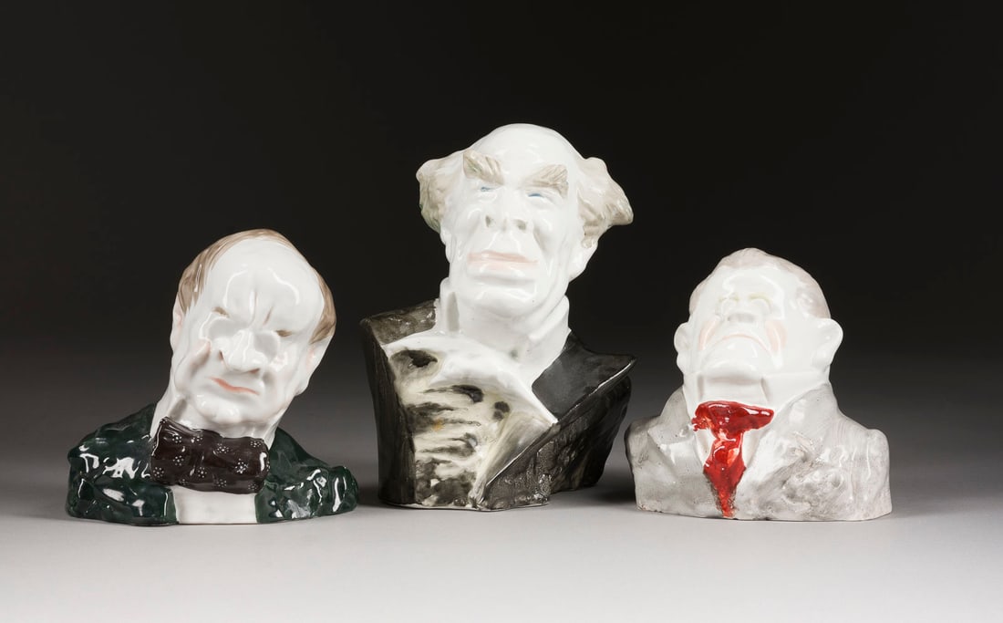| DREI BUeSTEN NACH DER 'FREUNDLICHEN KARIKATUR' VON KUKRYNIKSY: THREE BUSTS AFTER THE "FRIENDLY CARICATURE" BY KUKRYNIKSY Soviet Union, Leningrad/Pesochnoye, Lomonosov Porcelain Factory / Pesochenskaya Faience Factory, M. V. Kupriyanov, P. N. Krylov and N. A. Soko
