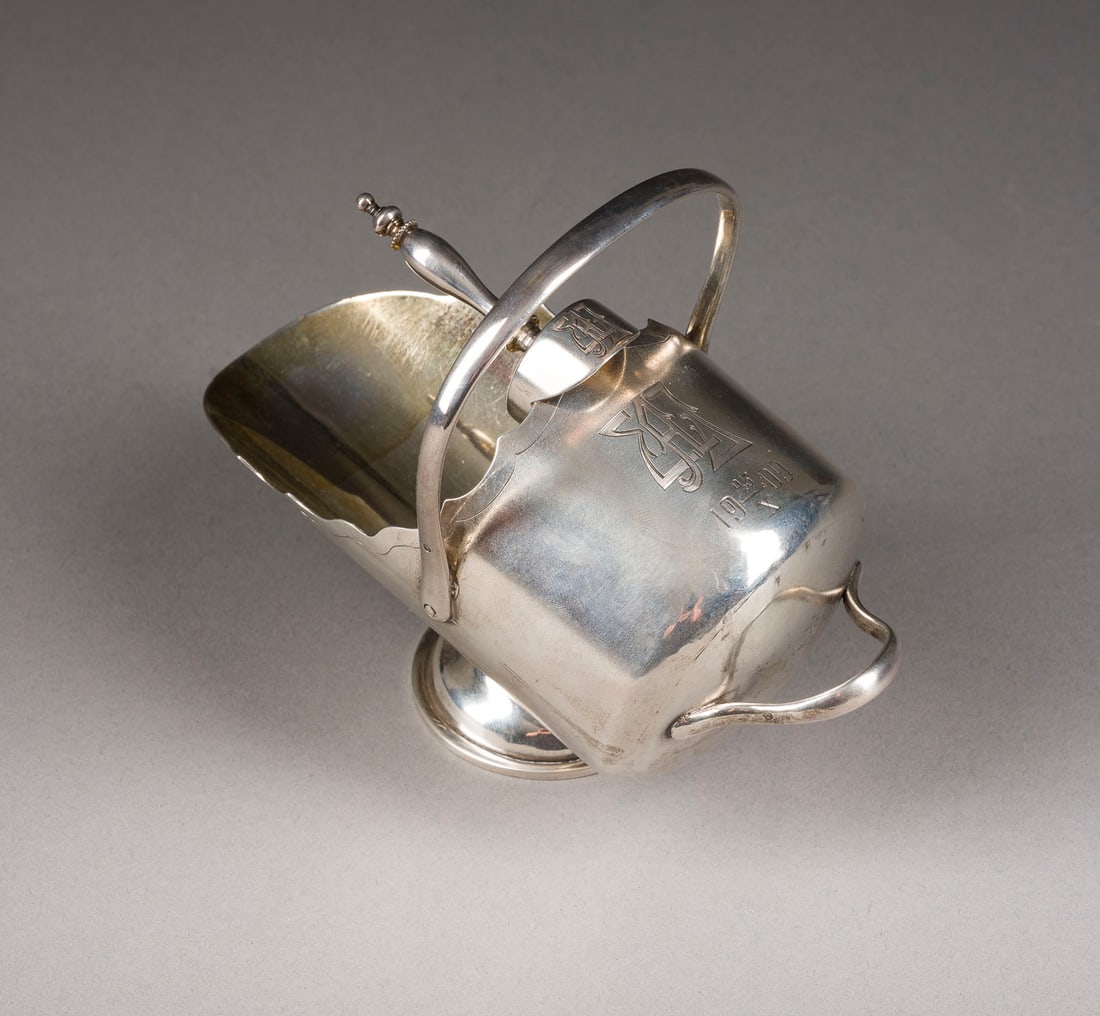 | ZUCKERSCHALE UND ZUCKERSCHAUFEL: A RARE SILVER SUGAR BOWL WITH SHOVEL Kiev, Joseph Marshak, 1908-1917 The body engraved with initials and date '25 X 1909'. Marked with assayer's mark, 84 standard and master's mark 'I. MARSHAK' in