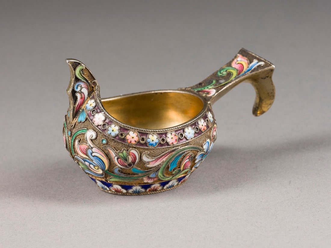 | KLEINER JUGENDSTIL-CLOISONNE-EMAIL-KOWSCH: A FINE SILVER-GILT AND CLOISONNE ENAMEL KOVSH Russian, Moscow, Nikolay Zverev, 1908-1917 Of traditional form. The base engraved with initials. Marked under base with assayer's mark, 84 standard and