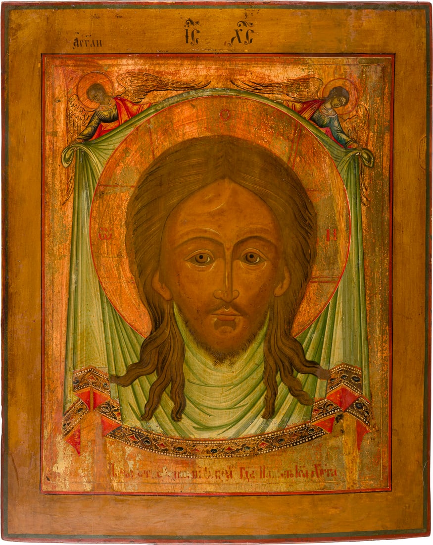 | GROSSFORMATIGE IKONE MIT DEM MANDYLION: A LARGE ICON SHOWING THE MANDYLION Russian, 18th century Tempera on wood panel. The background made of gold. Vertical crack and border restored. 53.2 x 43 cm.GROSSFORMATIGE IKONE MIT DEM MANDYLION Rus