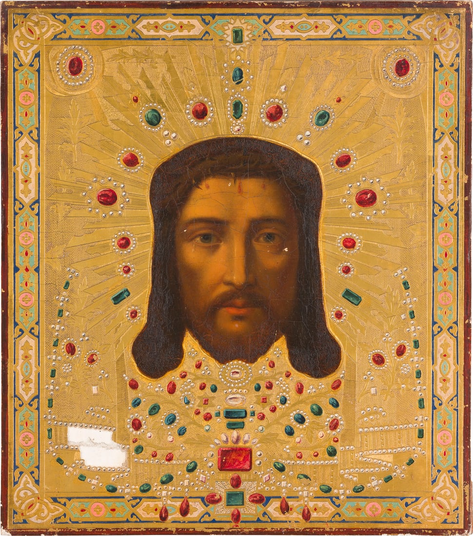 | IKONE MIT DEM MANDYLION: AN ICON SHOWING THE MANDYLION Russian, St. Petersburg, circa 1880 Oil on wood panel. Finely executed on a gold ground. The halo and borders ornately incised. The corners painted with ornate strapwork