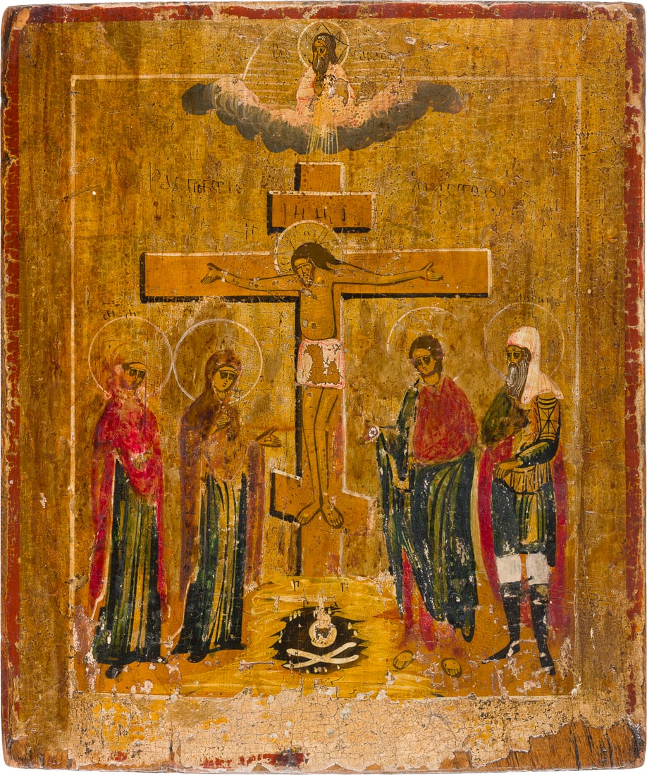 | IKONE MIT DER KREUZIGUNG CHRISTI: AN ICON SHOWING THE CRUCIFIXION OF CHRIST Russian, 19th century Tempera on wood panel. The background made of silver, covered by a golden lacquer. Losses, partially restored. 30.8 x 26.1 cm.IKONE MIT