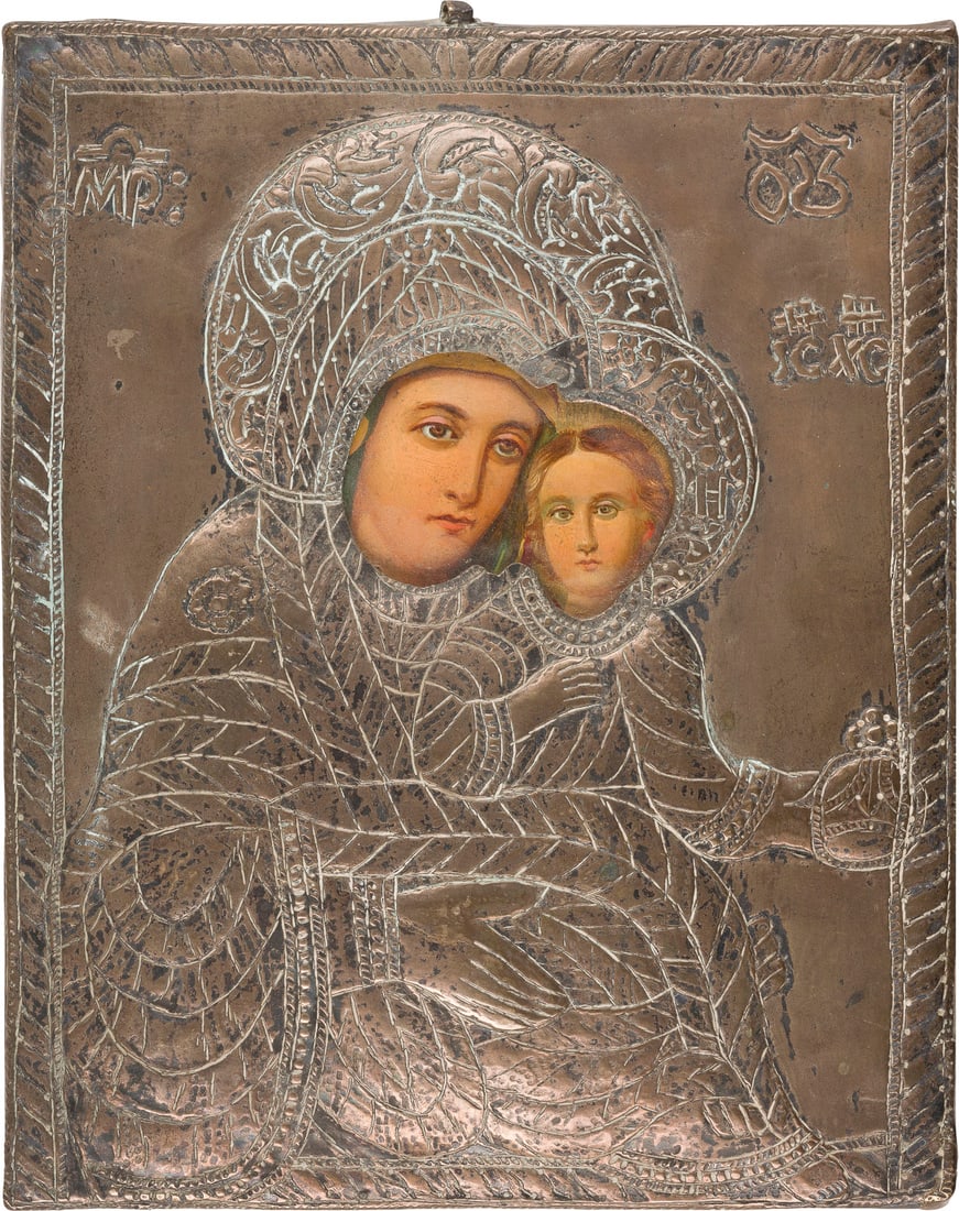 | IKONE MIT DER GOTTESMUTTER MIT OKLAD: AN ICON SHOWING THE MOTHER OF GOD WITH OKLAD Romanian, 19th century Oil on wood panel. The haloes made of gold. The metal oklad repousse and chased. Minimally restored. 25 x 20.5 cm.IKONE MIT DER GOTT