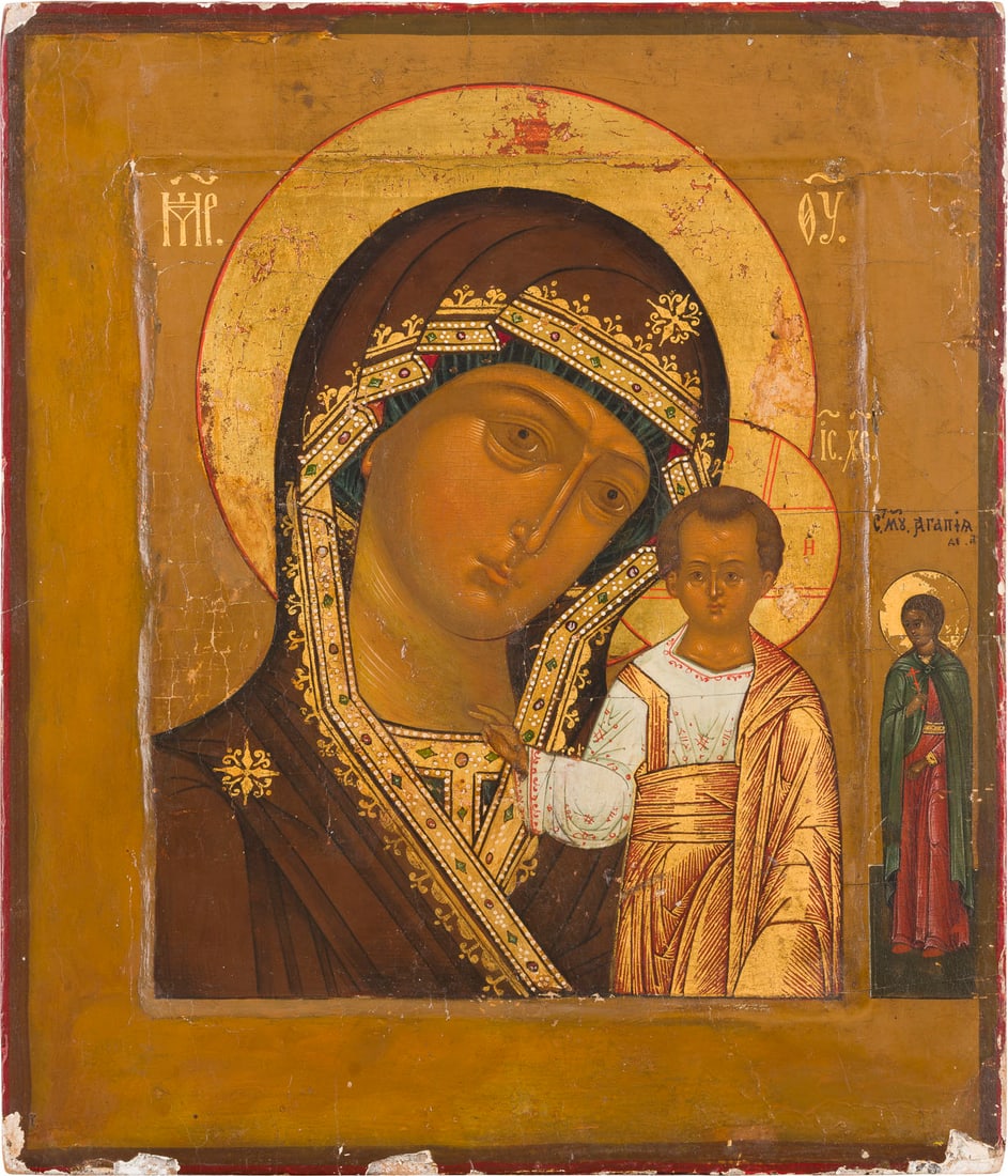 | FEINE IKONE MIT DER GOTTESMUTTER VON KASAN (KASANKSKAJA): A FINE ICON SHOWING THE KAZANSKAYA MOTHER OF GOD Russian, Mstera, late 19th century Tempera on wood panel with kovcheg. The haloes made of gold. St. Agathia appears on the right border. The lower imag