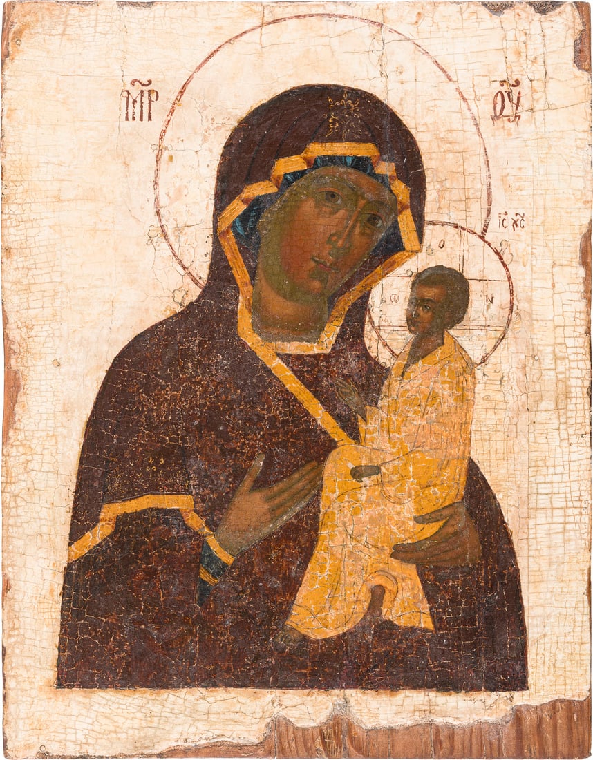 | IKONE MIT DER GOTTESMUTTER VON TICHWIN (TICHWINSKAJA): AN ICON SHOWING THE TIKHVINSKAYA MOTHER OF GOD Russian, 17th century Tempera on wood panel. The background stripped to the gesso, losses. 29.7 x 22.8 cm.IKONE MIT DER GOTTESMUTTER VON TICHWIN (TICHWIN