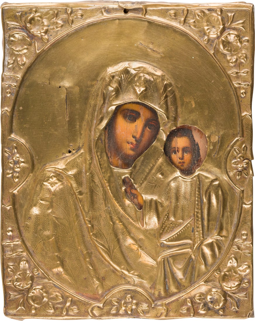 | KLEINE IKONE MIT DER GOTTESMUTTER VON KASAN (KASANSKAJA) MIT OKLAD: A SMALL ICON SHOWING THE KAZANSKAYA MOTHER OF GOD WITH OKLAD Russian, 19th century Oil on wood panel. The brass oklad chased and repousse. Losses, damages. 21.6 x 17.2 cm.KLEINE IKONE MIT DER GOTTESMU