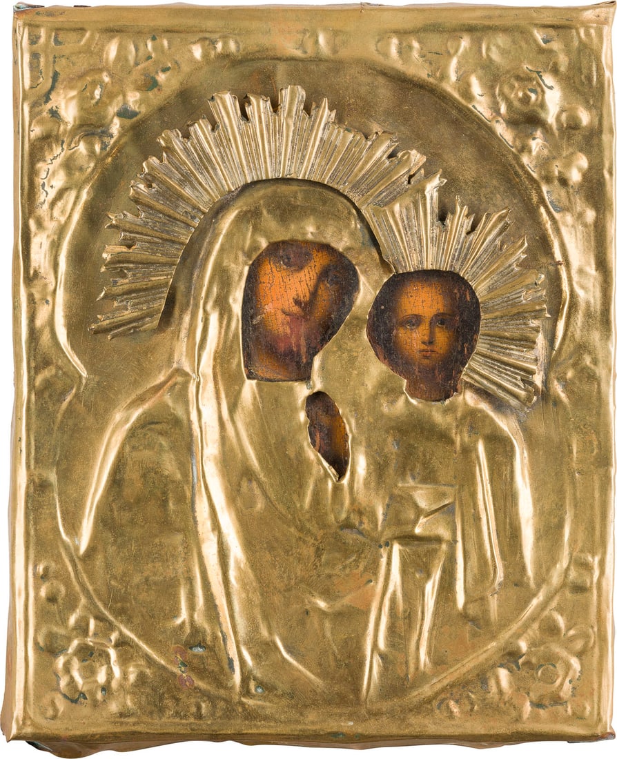 | KLEINE IKONE MIT DER GOTTESMUTTER VON KASAN (KASANSKAJA) MIT OKLAD: A SMALL ICON SHOWING THE KAZANSKAYA MOTHER OF GOD WITH OKLAD Russian, 19th century Oil on wood panel. The brass oklad chased and repousse. Wearings. 17.5 x 14.3 cm.KLEINE IKONE MIT DER GOTTESMUTTER VO