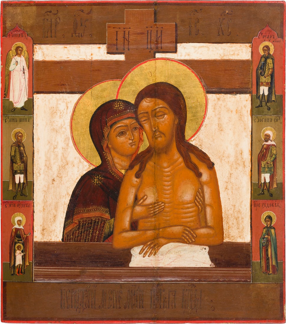 | IKONE 'WEINE NICHT UM MICH, MUTTER': AN ICON 'MOTHER DO NOT WEEP FOR ME' Russian, 19th century Tempera on wood panel with kovcheg. The haloes made of gold. Six patron saints represented on the border, the Guardian Angel, Sts. Menas and Y