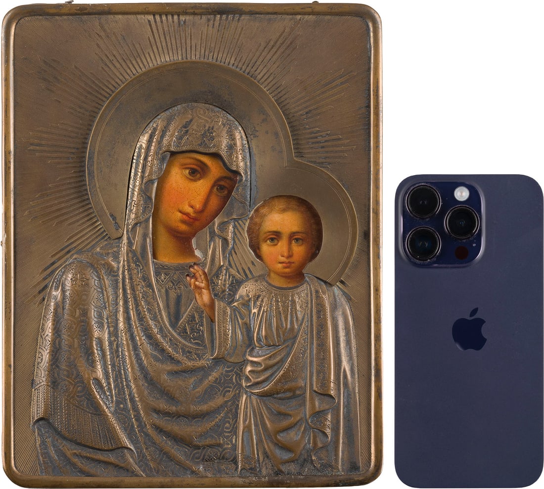 | GROSSE IKONE MIT DER GOTTESMUTTER VON KASAN (KASANSKAJA) MIT VERMEIL-OKLAD: A LARGE ICON SHOWING THE KAZANSKAYA MOTHER OF GOD WITH SILVER-GILT OKLAD Russian, St. Petersburg, 1886 Oil on wood panel with cloth backing. The silver-gilt oklad chased and engraved with sunburst pat