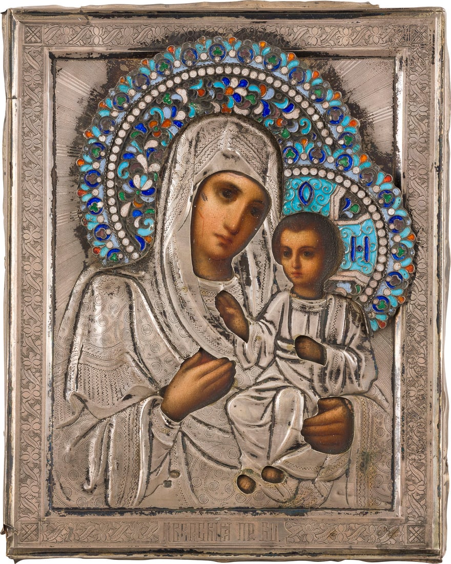 | KLEINE IKONE MIT DER GOTTESMUTTER 'IWERSKAJA' MIT CLOISONNE-EMAIL-OKLAD: A SMALL ICON SHOWING THE IVERSKAYA MOTHER OF GOD WITH A SILVER AND CLOISONNE ENAMEL OKLAD Russian, late 19th century (icon), Russian, Moscow, 1896-1908 (oklad) Oil on wood panel with velvet covering.