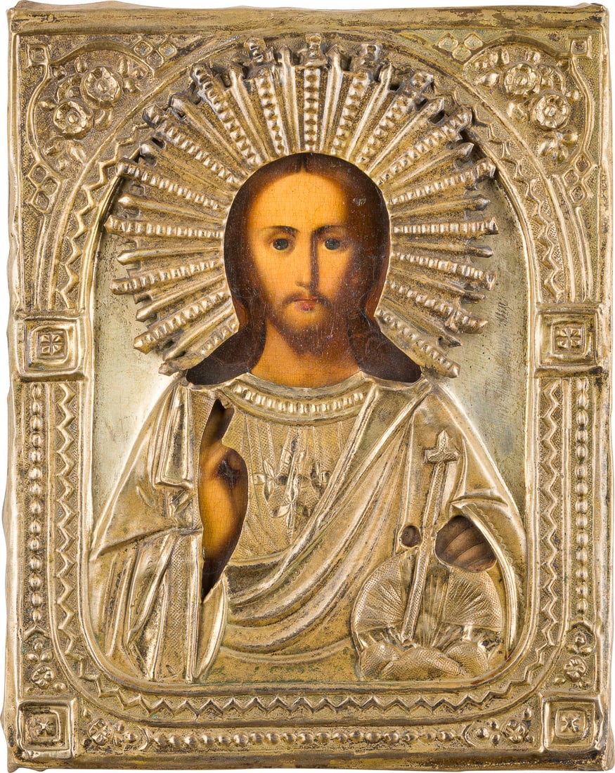 | IKONE MIT CHRISTUS DEM WELTENHERRSCHER MIT OKLAD: AN ICON SHOWING CHRIST THE SAVIOUR WITH OKLAD Russian, 19th century Oil on wood panel. The brass oklad chased and repousse. 27 x 22 cm.IKONE MIT CHRISTUS DEM WELTENHERRSCHER MIT OKLAD Russland, 19. Jh