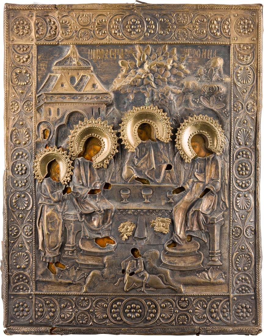 | GROSSFORMATIGE IKONE MIT DER ALTTESTAMENTLICHEN DREIFALTIGKEIT MIT OKLAD: A LARGE ICON SHOWING THE OLD TESTAMENT TRINITY WITH OKLAD Russian, 1st half of the 19th century Tempera on wood panel. The haloes made of silver. Overlaid with a chased and embossed brass oklad. Resto