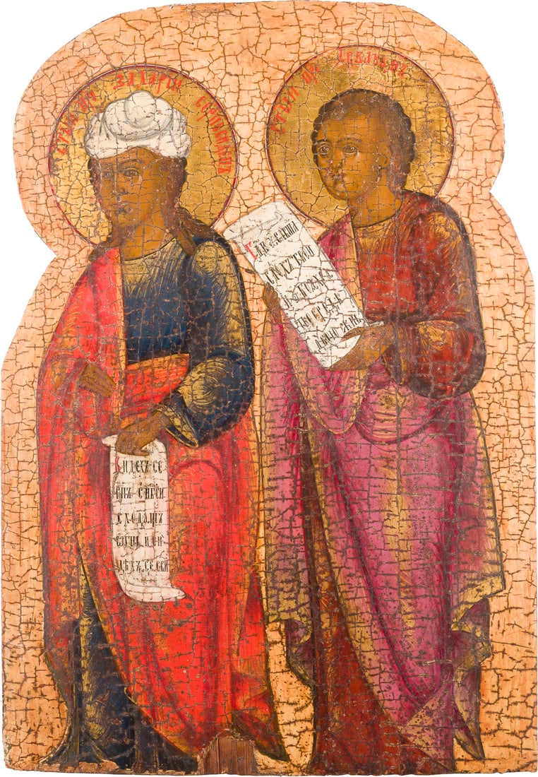 | GROSSFORMATIGE IKONE MIT DEN PROPHETEN ZACHARIAS UND AWWAKUM AUS EINER KIRCHEN-IKONOSTASE: A LARGE ICON OF THE PROPHETS ZECHARIAH AND AVVAKUM FROM A CHURCH ICONOSTASIS Russian, circa 1800 Tempera on wood panel. The haloes made of gold. The background stripped to gesso, losses. 48.3 x 33.8 c