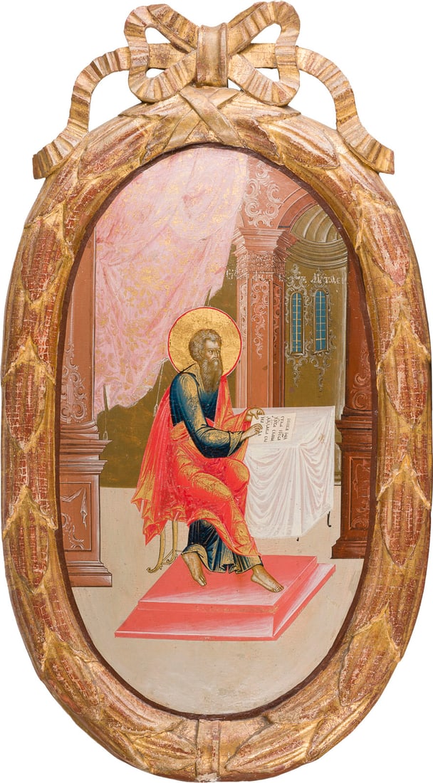 | GROSSFORMATIGE IKONE MIT DEM EVANGELISTEN MATTHAeUS AUS EINER KIRCHEN-IKONOSTASE: A MONUMENTAL ICON SHOWING ST. MATTHEW THE EVANGELIST FROM A CHURCH ICONOSTASIS Russian, late 18th century Tempera on wood panel. The gilt-wood border caved and decorated with foliage. The halo made of
