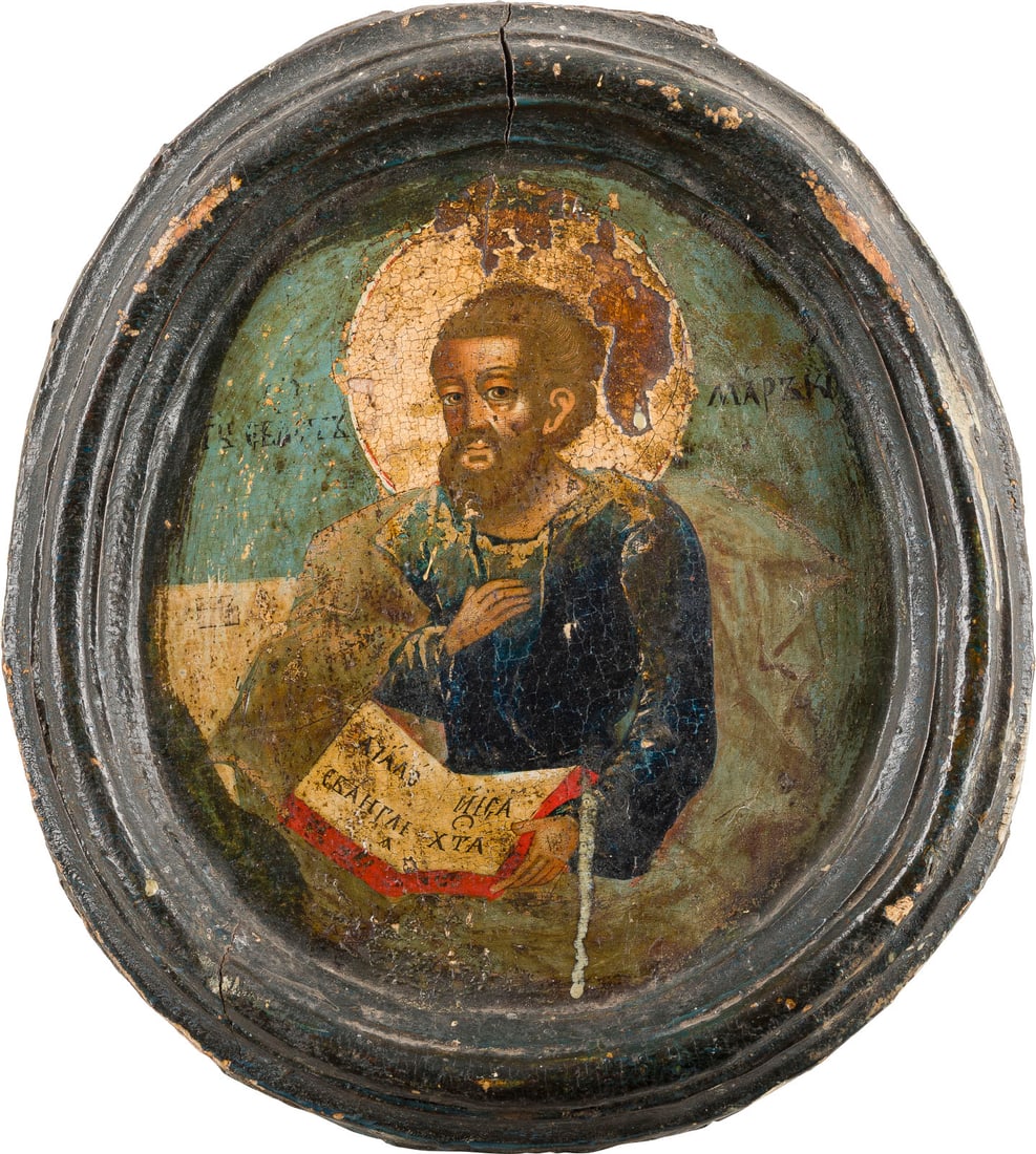 | KLEINE IKONE MIT DEM EVANGELISTEN MARKUS: A SMALL ICON SHOWING ST. MARK THE EVANGELIST Russian, early 18th century Tempera on wood panel. Losses.28.5 x 25 cm.KLEINE IKONE MIT DEM EVANGELISTEN MARKUS Russland, Anfang 18. Jh. Holztafel, Eitempe