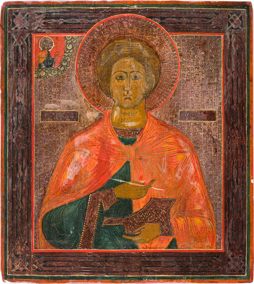 | IKONE MIT DEM HEILIGEN PANTELEIMON: AN ICON SHOWING ST. PANTELEIMON Russian, late 19th century Tempera on wood panel. The background made of silver. The background with etched tracery design, the border emulating contemporary enamelwork