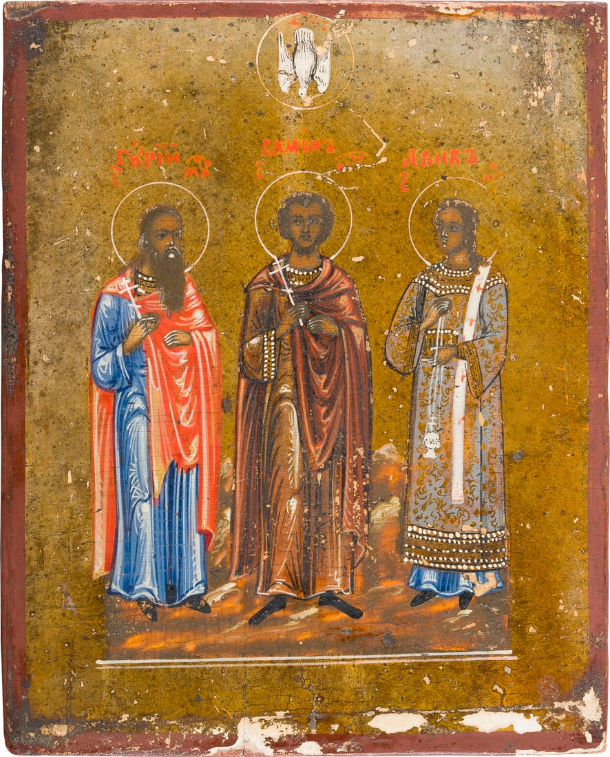 | KLEINE IKONE MIT DEN HEILIGEN SAMON, GURIJ UND AVIV: A SMALL ICON SHOWING STS. SAMON, GURIY AND AVIV Russian, 19th century Tempera on wood panel. The background made of silver, covered by a golden lacquer. Losses to the edges. 19.4 x 15.3 cm.KLEINE IKON